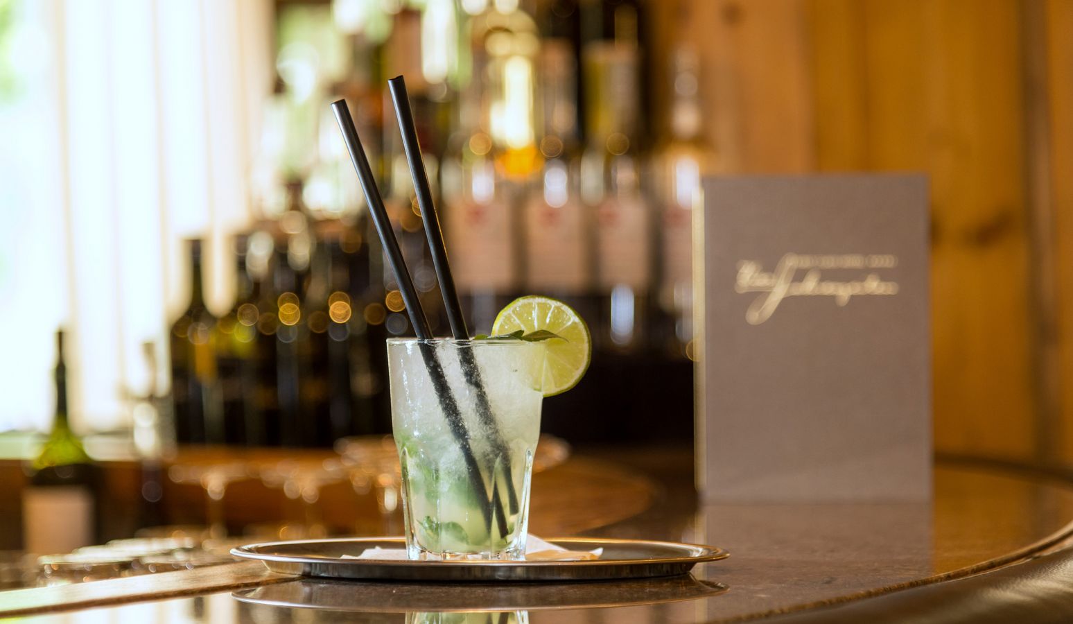 Bartender Robert Gasteiger preparing cocktails at Hotel Vier Jahreszeiten bar Bartender Robert Gasteiger preparing cocktails at Hotel Vier Jahreszeiten bar