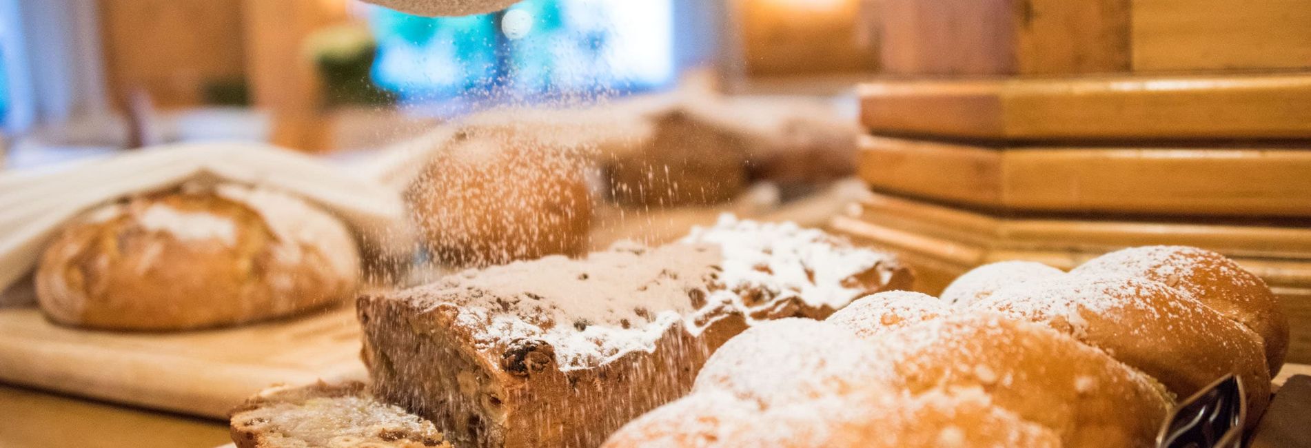 Breakfast buffet at Vier Jahreszeiten hotel with fresh pastries, fruits, and beverages Breakfast buffet at Vier Jahreszeiten hotel with fresh pastries, fruits, and beverages