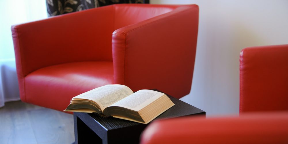 Penthouse designer suite sitting area with mountain view at Alpen Hotel Vier Jahreszeiten