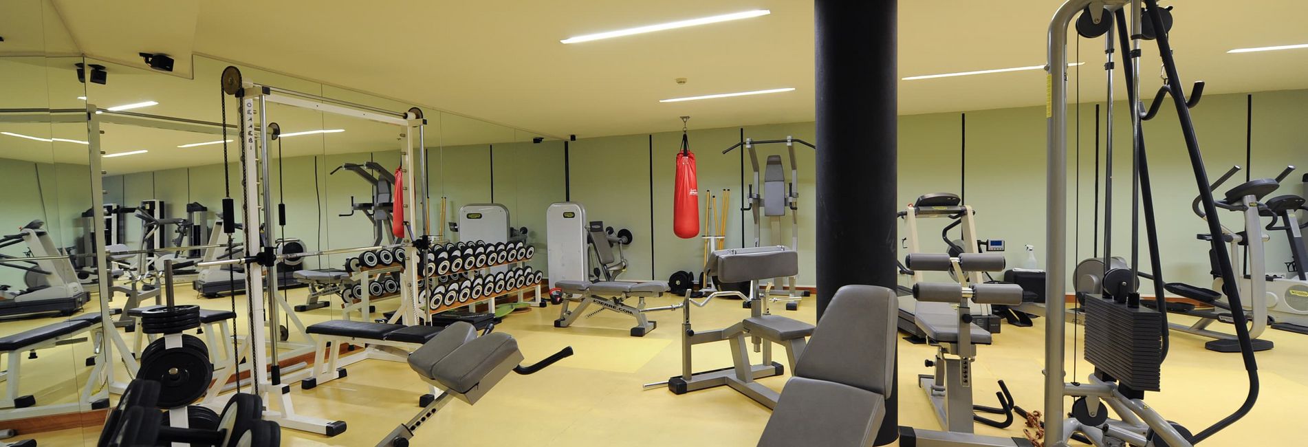 Modern fitness room at Vier Jahreszeiten Hotel Schlanders with exercise equipment Modern fitness room at Vier Jahreszeiten Hotel Schlanders with exercise equipment