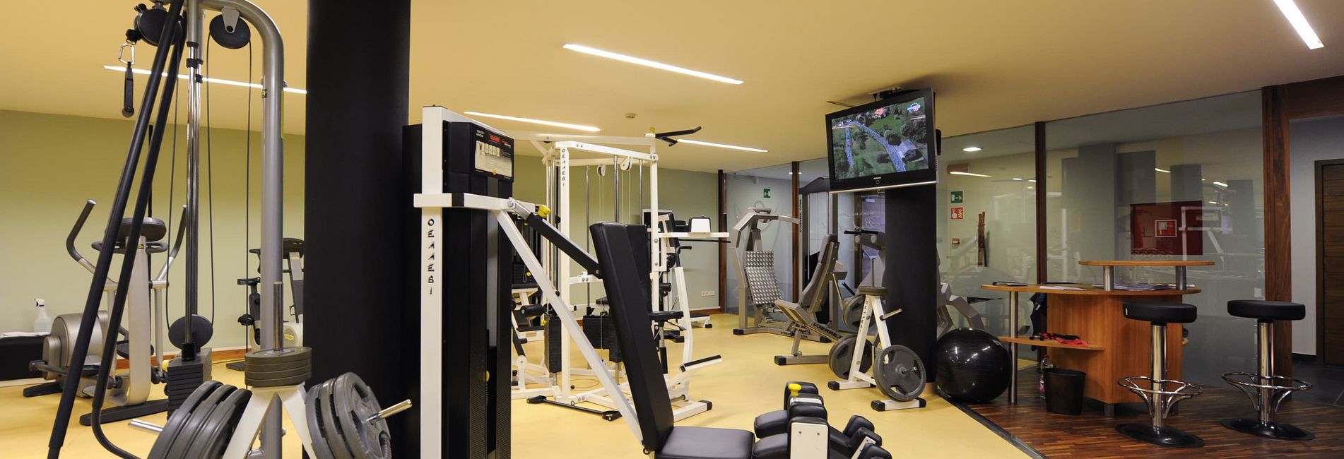 Modern hotel gym with fitness equipment at Vier Jahreszeiten in Schlanders Modern hotel gym with fitness equipment at Vier Jahreszeiten in Schlanders