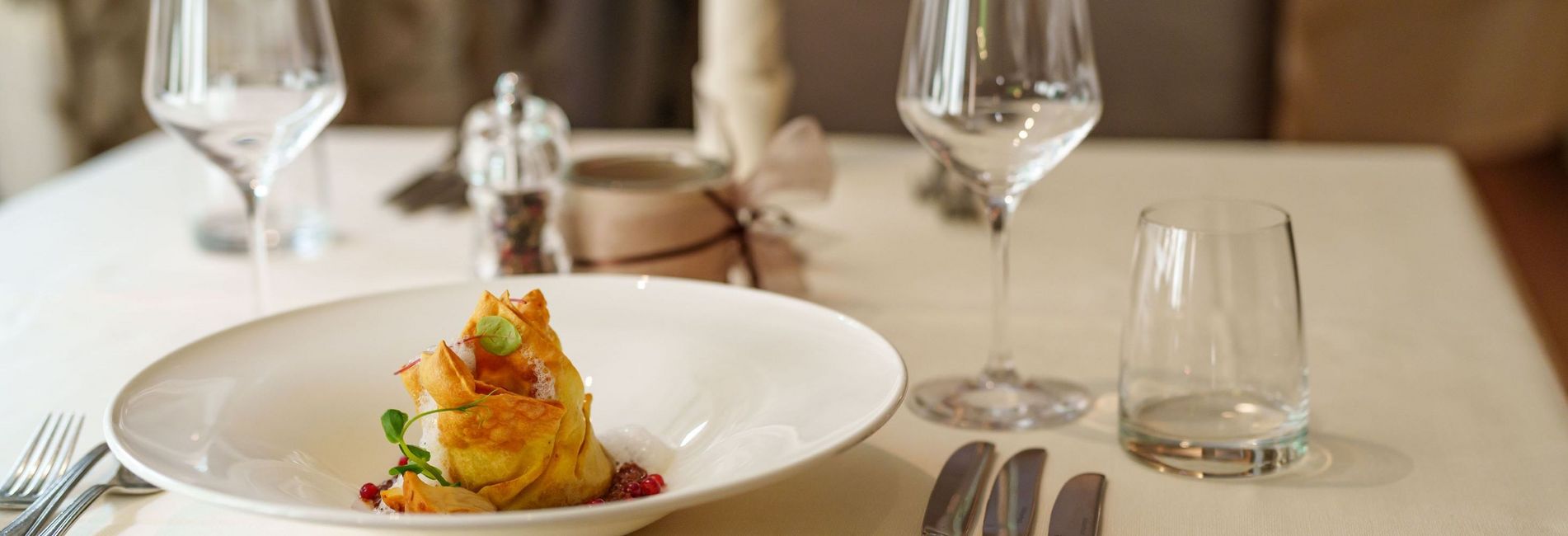 Piatti gourmet al ristorante dell'Hotel Vier Jahreszeiten a Silandro