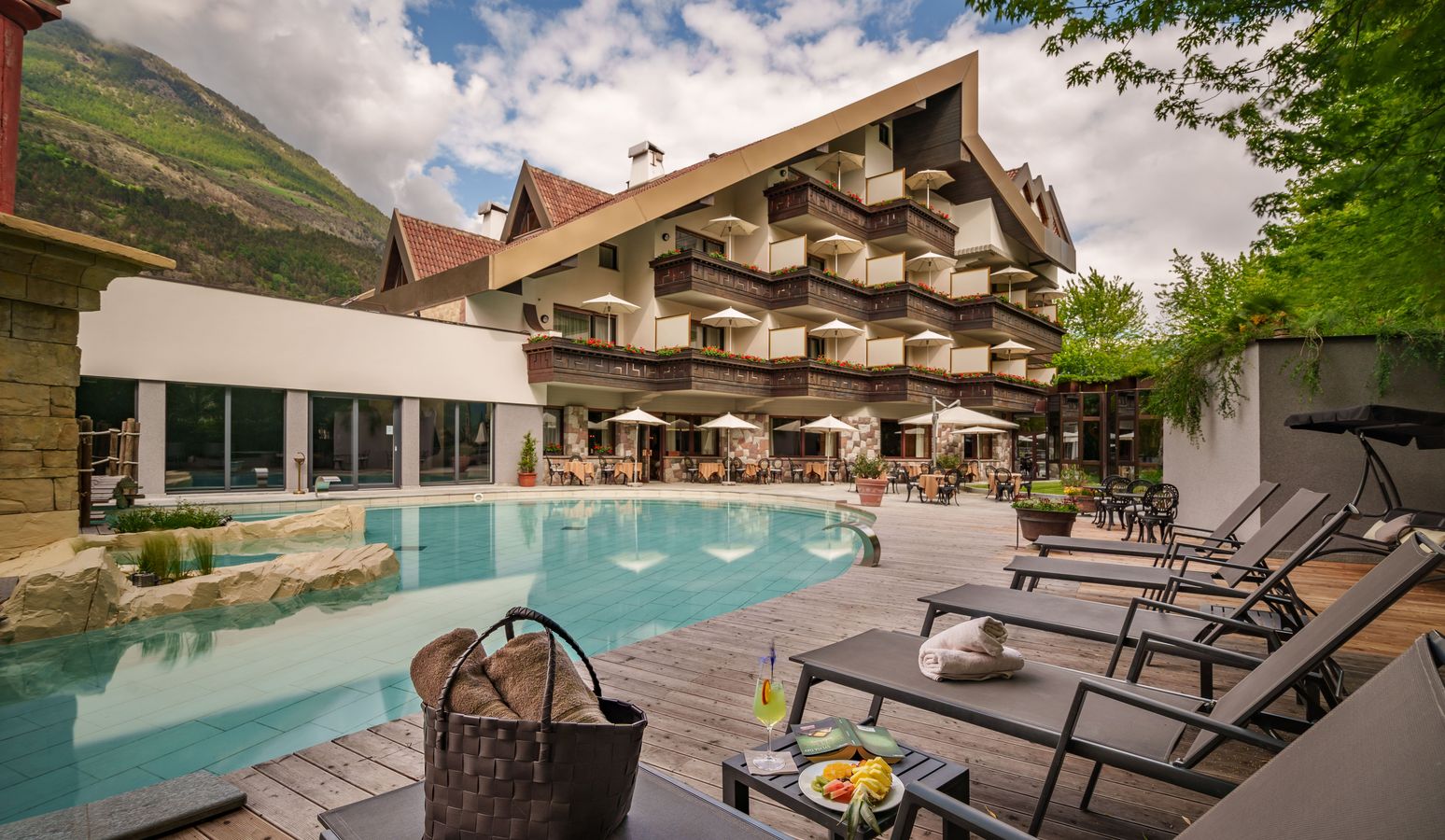 Outdoor pool and bathing landscape at Hotel Vier Jahreszeiten in South Tyrol Outdoor pool and bathing landscape at Hotel Vier Jahreszeiten in South Tyrol